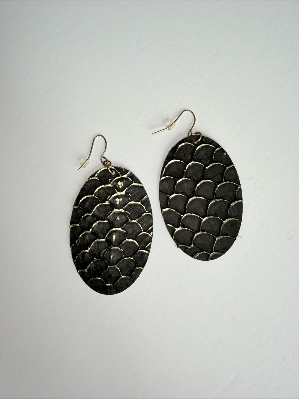 Textured Black Oval Drop Earrings with Metallic Accents